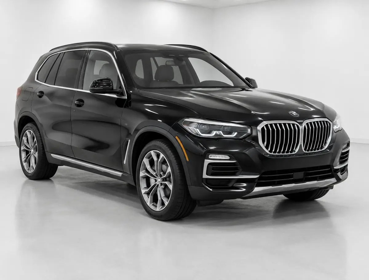 Black premium SUV in a clean vehicle photo studio
